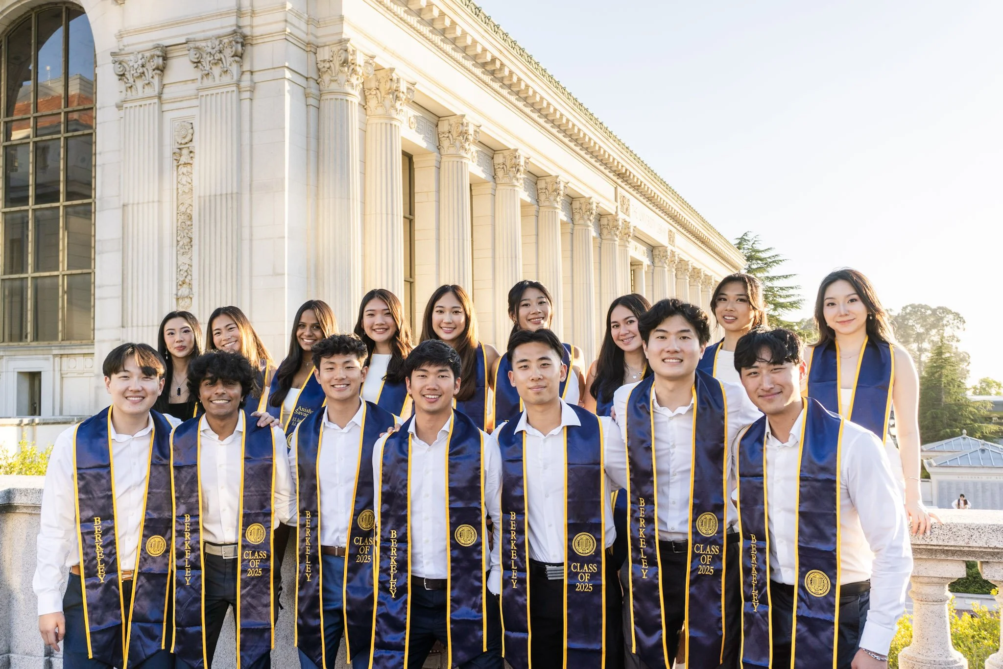 Brothers in Berkeley graduation sashes